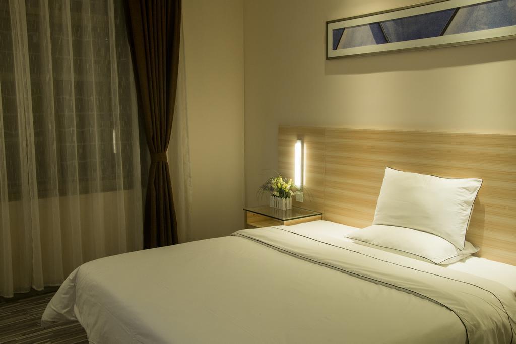 Denise Hotel Apartment Guangzhou Kamer foto
